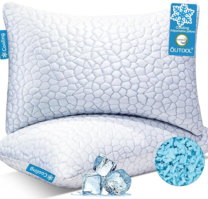 Two white cooling pillows with an ice-style pattern, shown with ice cubes and blue shredded filling, featuring the QUTOOL Cooling Pillow for Sleeping 2 Pack Queen Pillows.