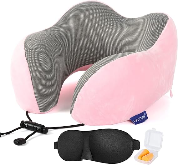GOTDYA Travel Pillow in pink, complete with earplugs and an eye mask, designed for easy and restful travel comfort.